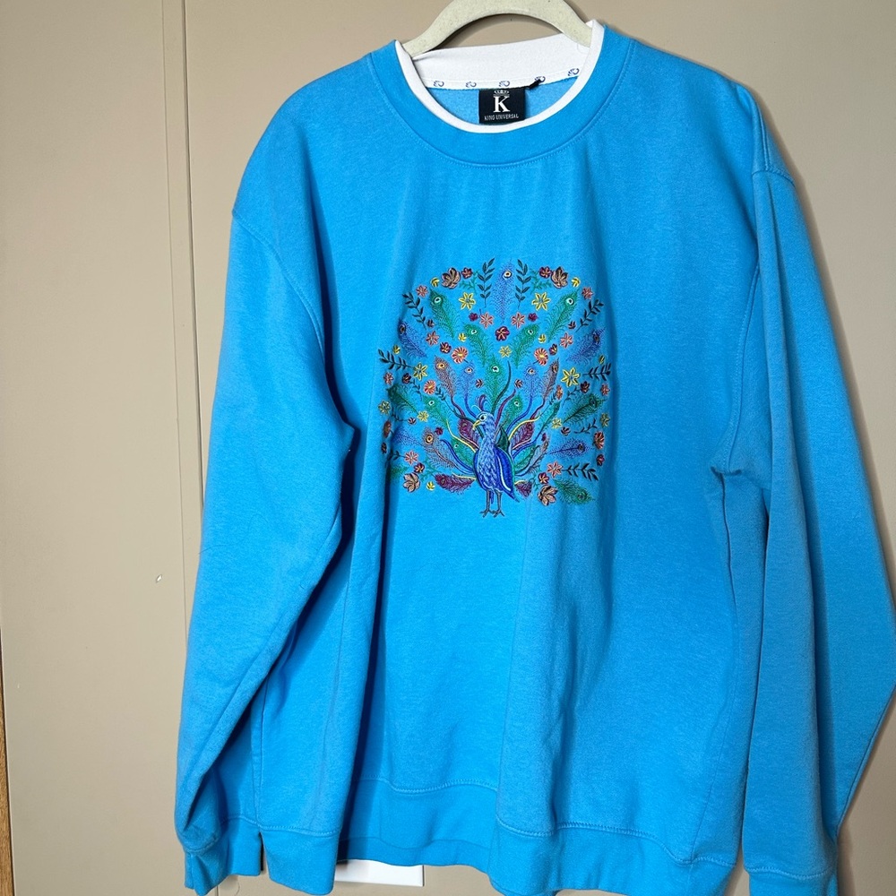 Universal Vibrant Blue Peacock Sweatshirt